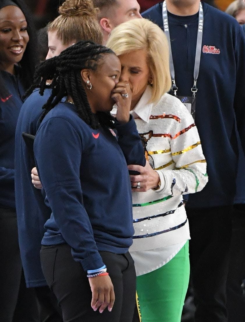Louisiana State University Coach Kim Mulkey walks on the court and meets with Ole Miss Head Coach Yolett McPhee-McCuin before the game with Ole Miss in the SEC Women's Basketball Tournament game at the Bon Secours Wellness Arena in Greenville, S.C. Saturday, March 9, 2024.