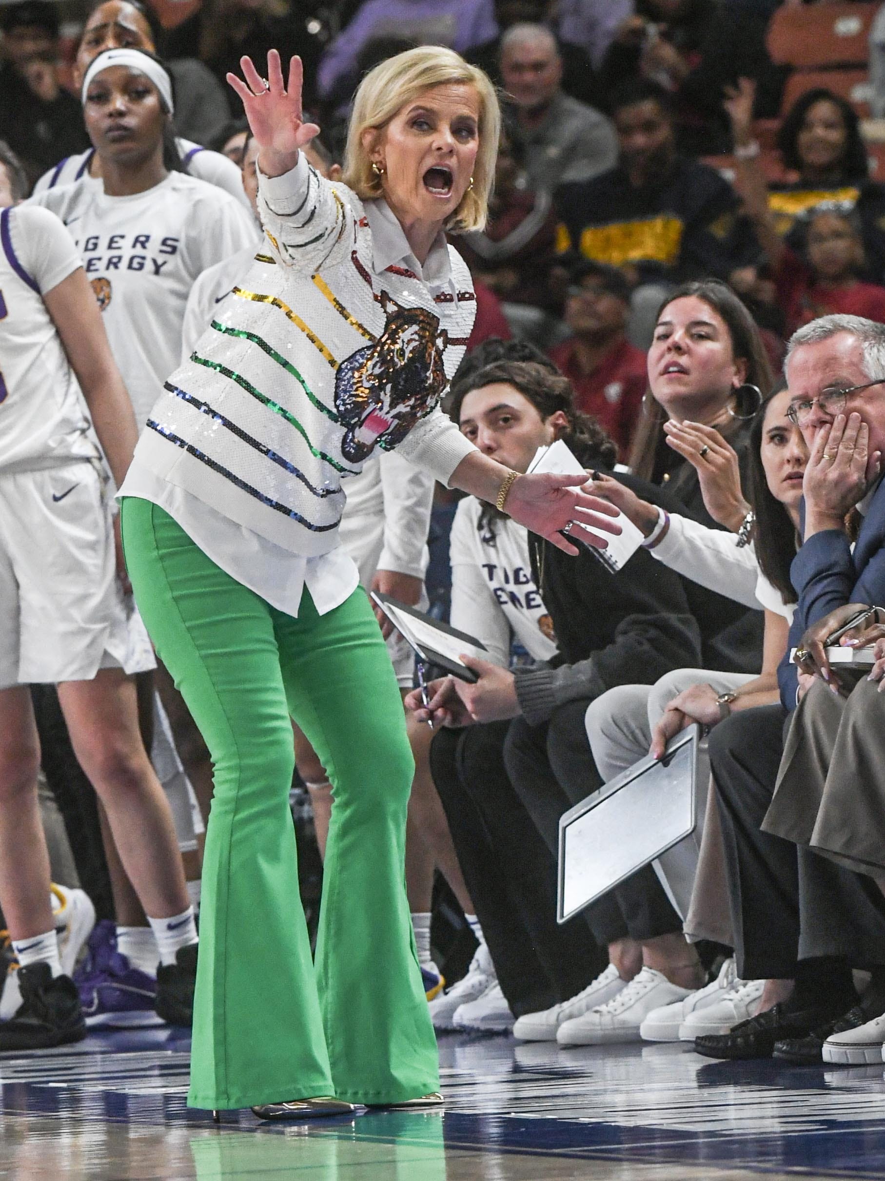 Louisiana State University Coach Kim Mulkey communicates with the bench during the first quarter of the SEC Women's Basketball Tournament game with Ole Miss at the Bon Secours Wellness Arena in Greenville, S.C. Saturday, March 9, 2024.