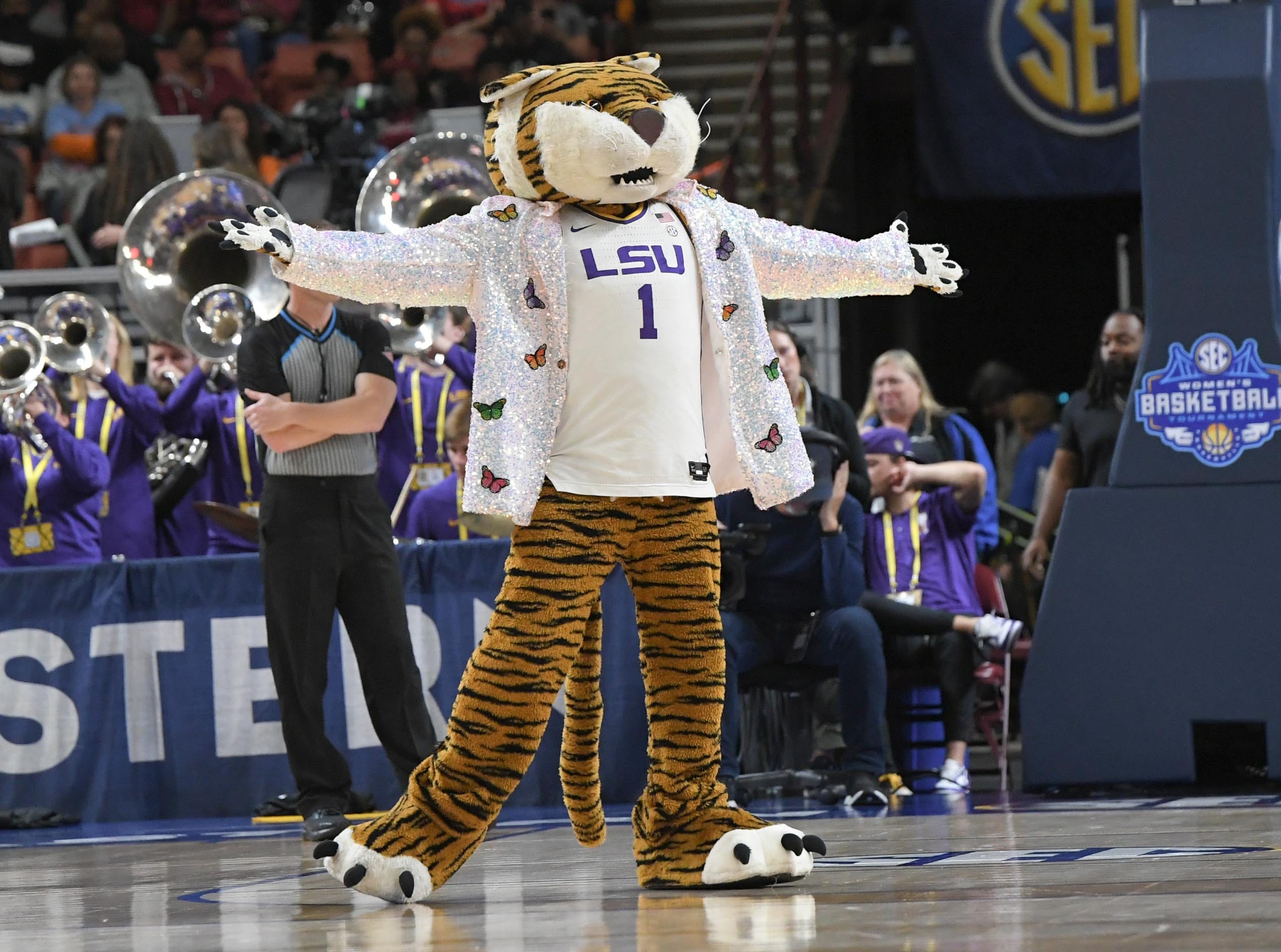 The LSU mascot wears a Kim Mulkey- inspired coat during the second quarter of the SEC Women's Basketball Tournament game at the Bon Secours Wellness Arena in Greenville, S.C. Saturday, March 9, 2024.