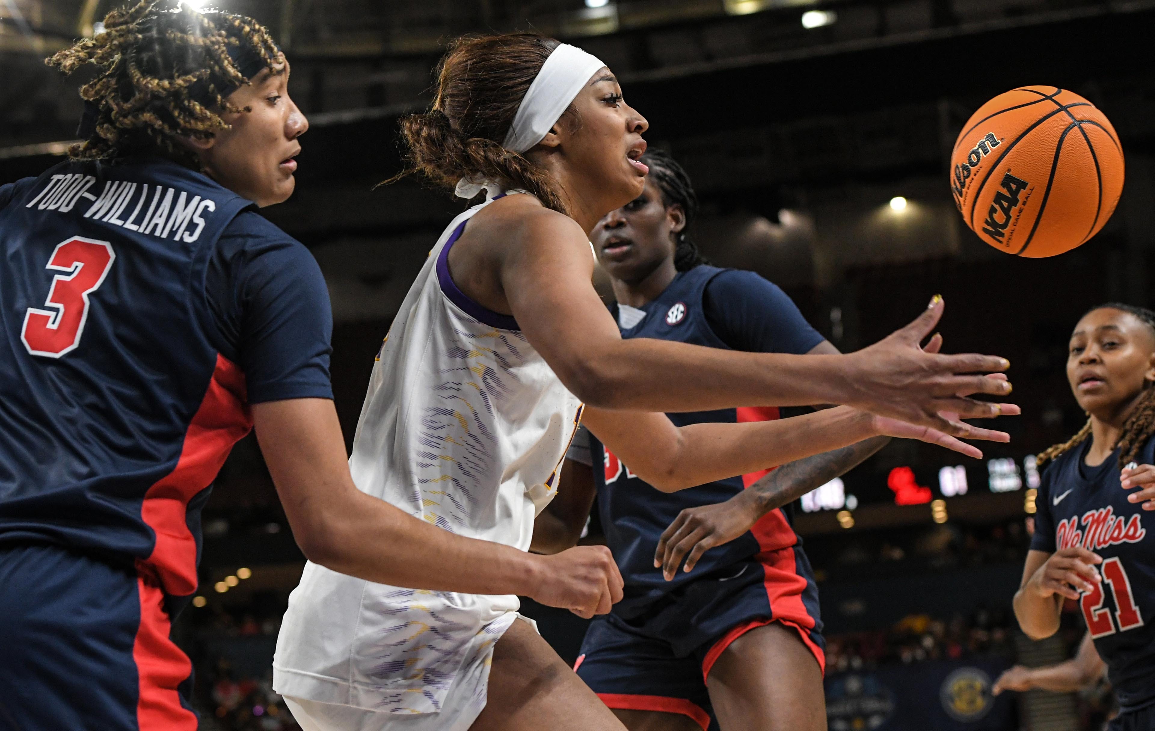 Louisiana State University forward Angel Reese (10) reaches for a rebound near Ole Miss guard Kennedy Todd-Williams (3) during the fourth quarter of the SEC Women's Basketball Tournament game at the Bon Secours Wellness Arena in Greenville, S.C. Saturday, March 9, 2024.