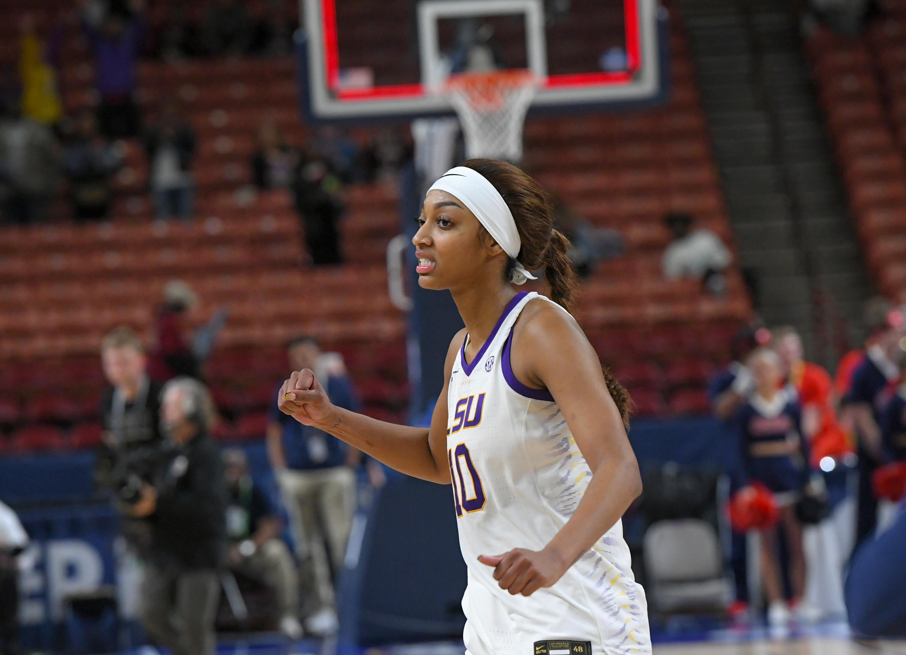 Louisiana State University forward Angel Reese (10) reacts after LSU beat Ole Miss 75-67 at the SEC Women's Basketball Tournament game at the Bon Secours Wellness Arena in Greenville, S.C. Saturday, March 9, 2024.