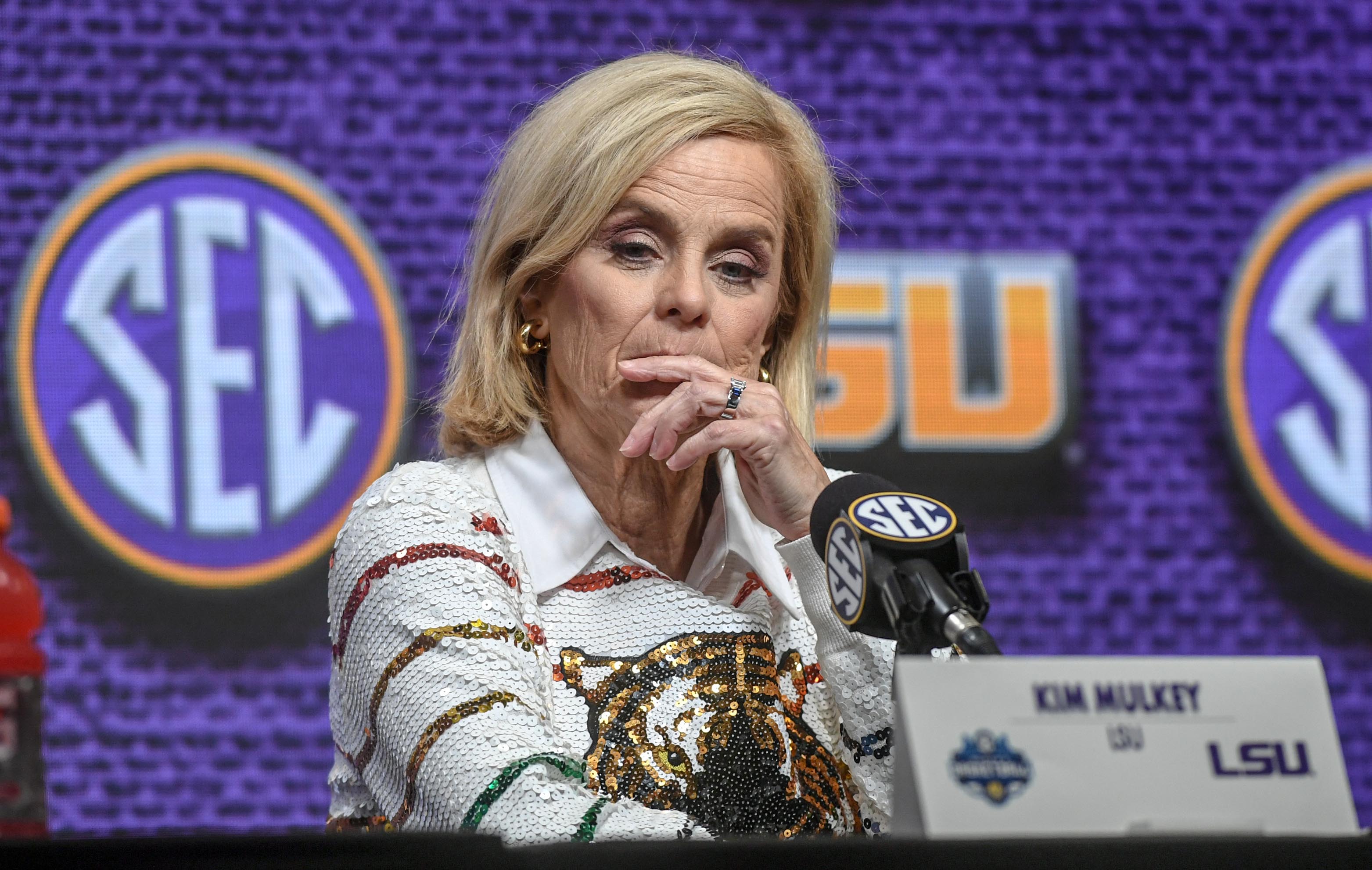 Louisiana State University Coach Kim Mulkey listens to a question from the media after LSU beat Ole Miss 75-67 at the SEC Women's Basketball Tournament game at the Bon Secours Wellness Arena in Greenville, S.C. Saturday, March 9, 2024.