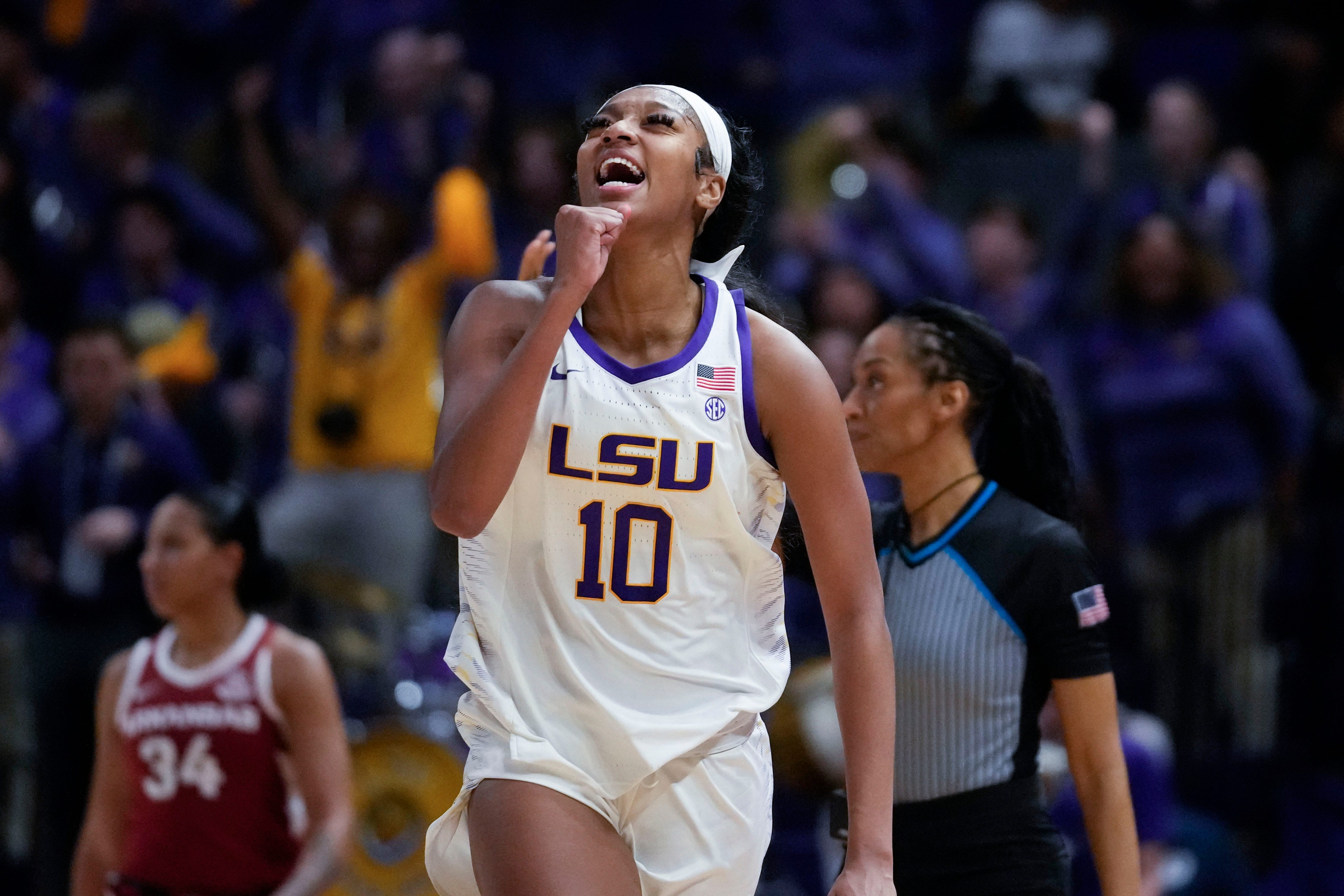 LSU forward Angel Reese (10) celebrates after a turnover in the second half an NCAA college basketball game against Arkansas in Baton Rouge, La., Thursday, Jan. 19, 2023. LSU won 79-76. (AP Photo/Gerald Herbert)
