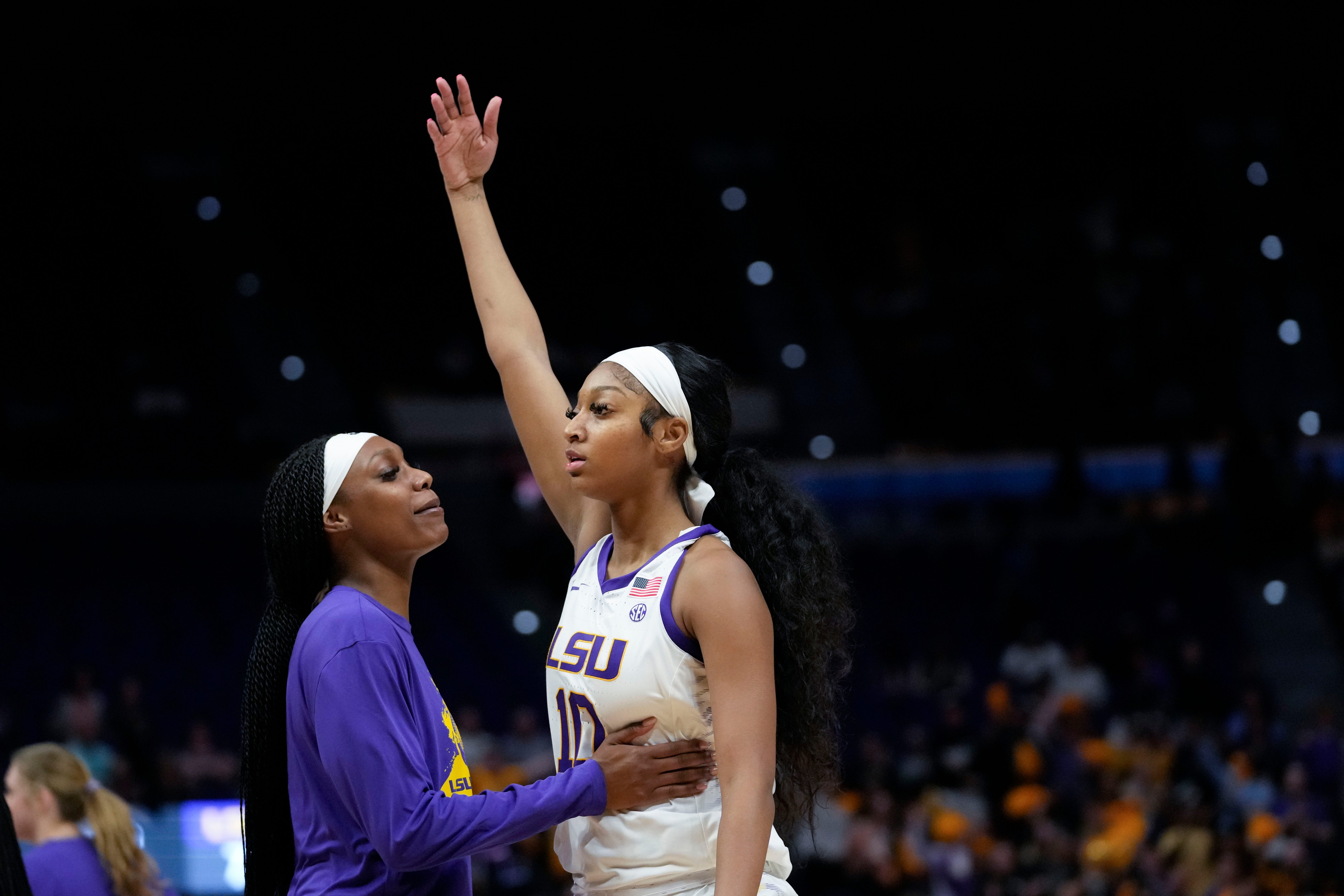 LSU forward Angel Reese (10) reacts during a timeout after scoring in the first half an NCAA college basketball game against Arkansas in Baton Rouge, La., Thursday, Jan. 19, 2023. (AP Photo/Gerald Herbert)