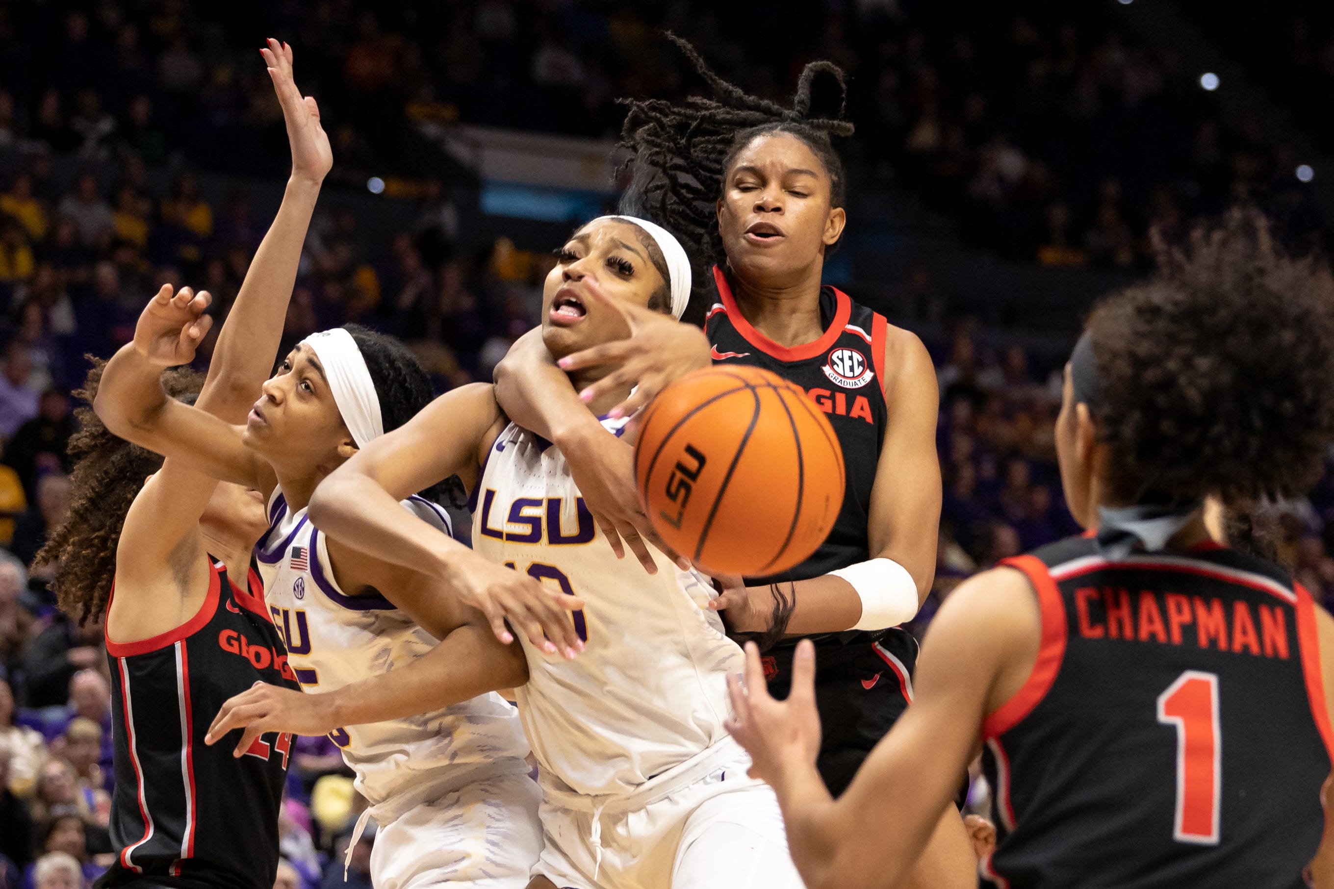 Feb 2, 2023; Baton Rouge, Louisiana, USA;  LSU Lady Tigers forward Angel Reese (10) is fouled by the Georgia Lady Bulldogs during the first half at Pete Maravich Assembly Center. Mandatory Credit: Stephen Lew-USA TODAY Sports