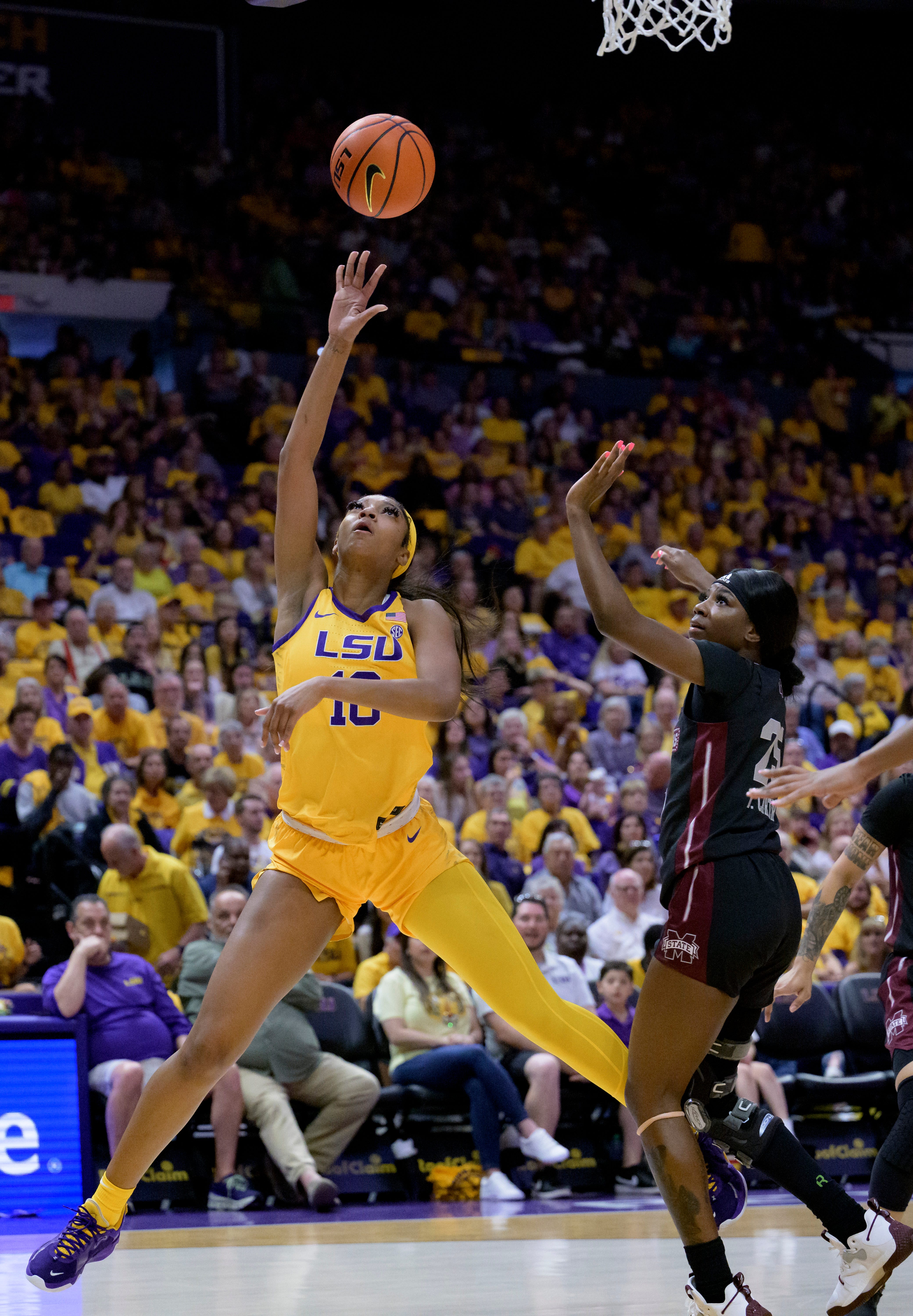 LSU forward Angel Reese (10) shoots against Mississippi State forward Denae Carter (25) in the first half of an NCAA basketball game Sunday, Feb. 26, 2023, in Baton Rouge, La. (AP Photo/Matthew Hinton)