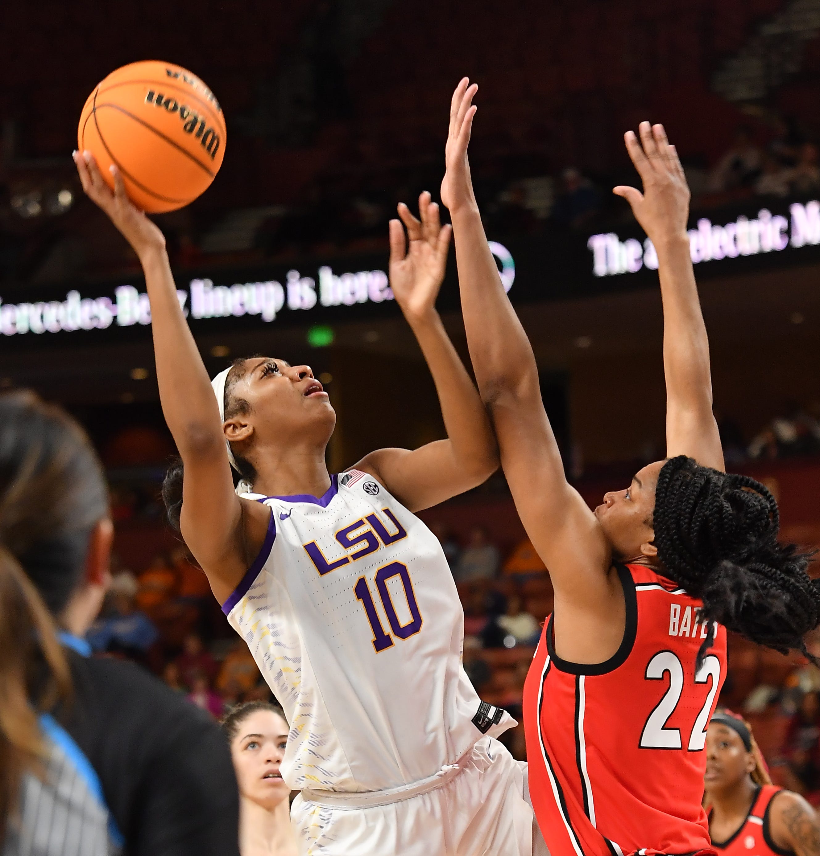 Georgia took on LSU in the SEC Women's Basketball Tournament  quarterfinals at the Bon Secours Wellness Arena in Greenville, S.C. Friday, March 3, 2023.  Louisiana State University forward Angel Reese (10) takes a shot as Georgia forward forward Malury Bates (22) defends.