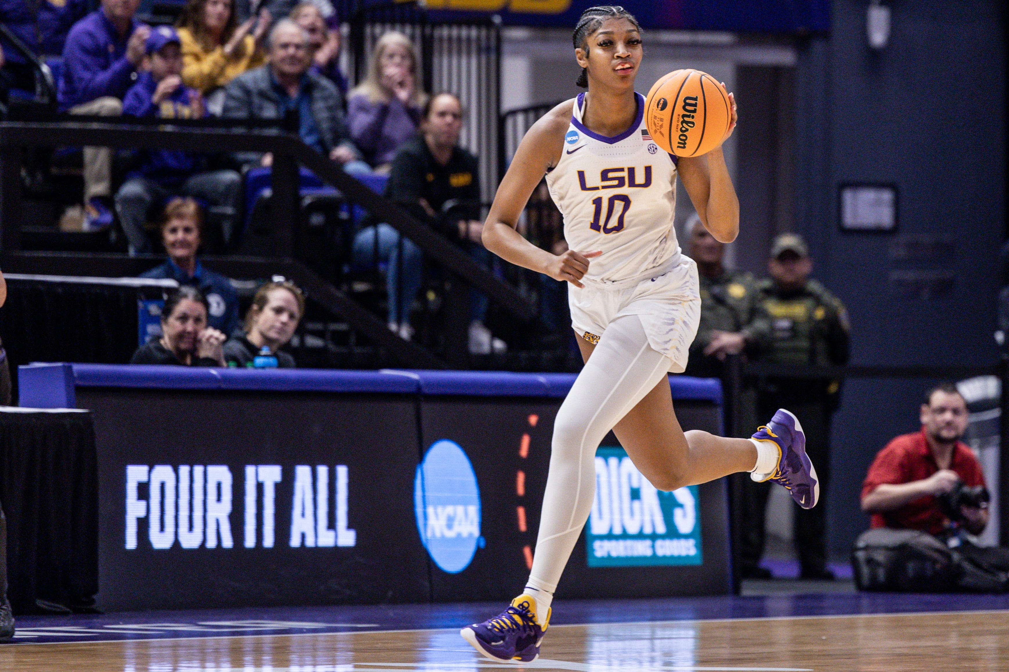 Mar 19, 2023; Baton Rouge, LA, USA; LSU Lady Tigers forward Angel Reese (10) brings the ball up court against the Michigan Wolverines during the first half at Pete Maravich Assembly Center. Mandatory Credit: Stephen Lew-USA TODAY Sports