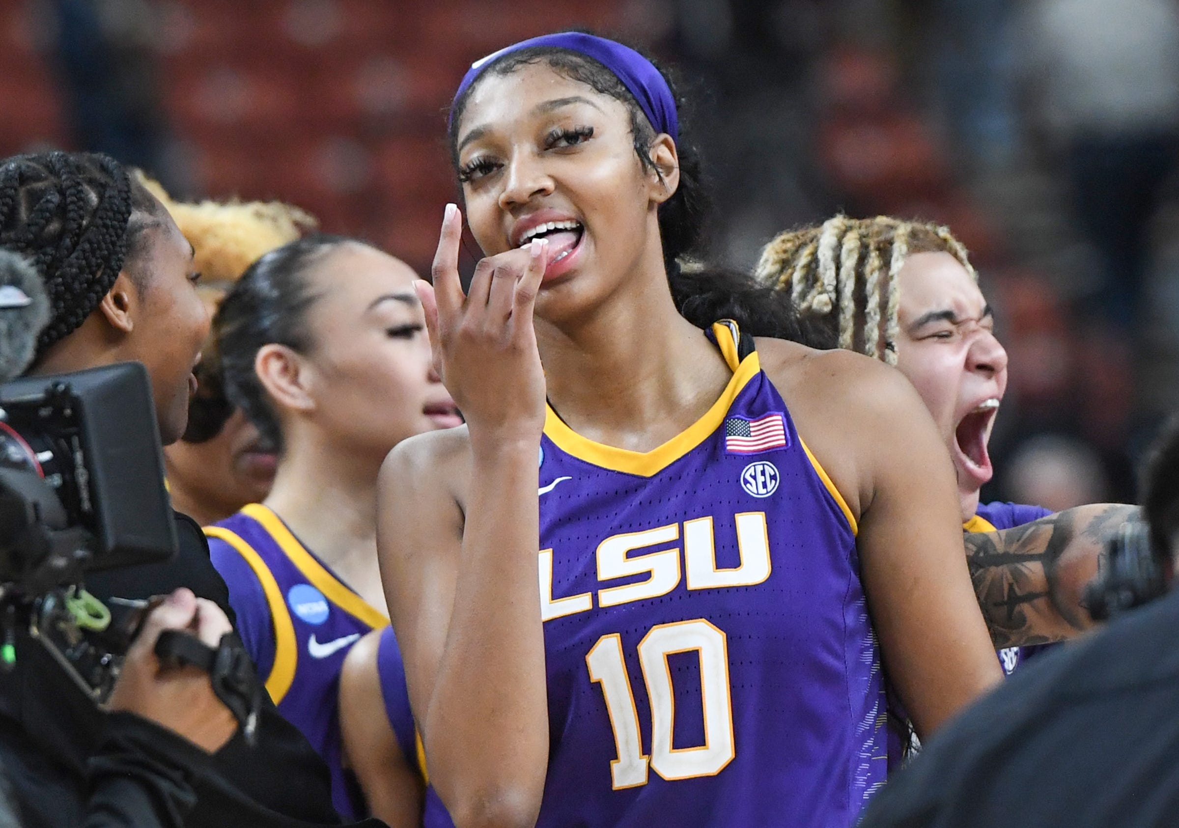 Louisiana State University forward Angel Reese (10),  celebrates with teammates after the 66-63 win over Utah in the Sweet 16 round of the NCAA Women's Tournament at Bon Secours Wellness Arena in Greenville, S.C. Friday, March 24, 2023.