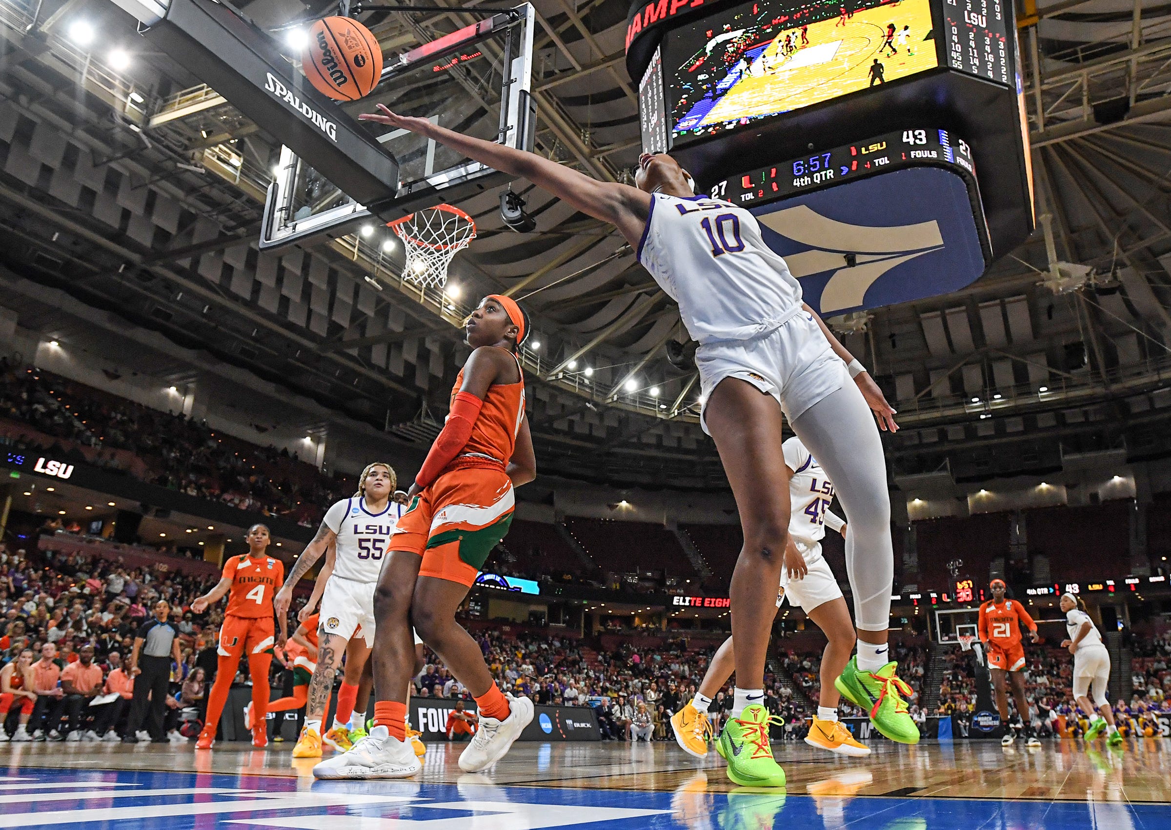 Louisiana State University forward Angel Reese (10) rebounds during the fourth quarter of the Elite Eight NCAA Women's Basketball Tournament game at the Bon Secours Wellness Arena in Greenville, S.C. Sunday, March 26, 2023. LSU beat Miami 54-42.