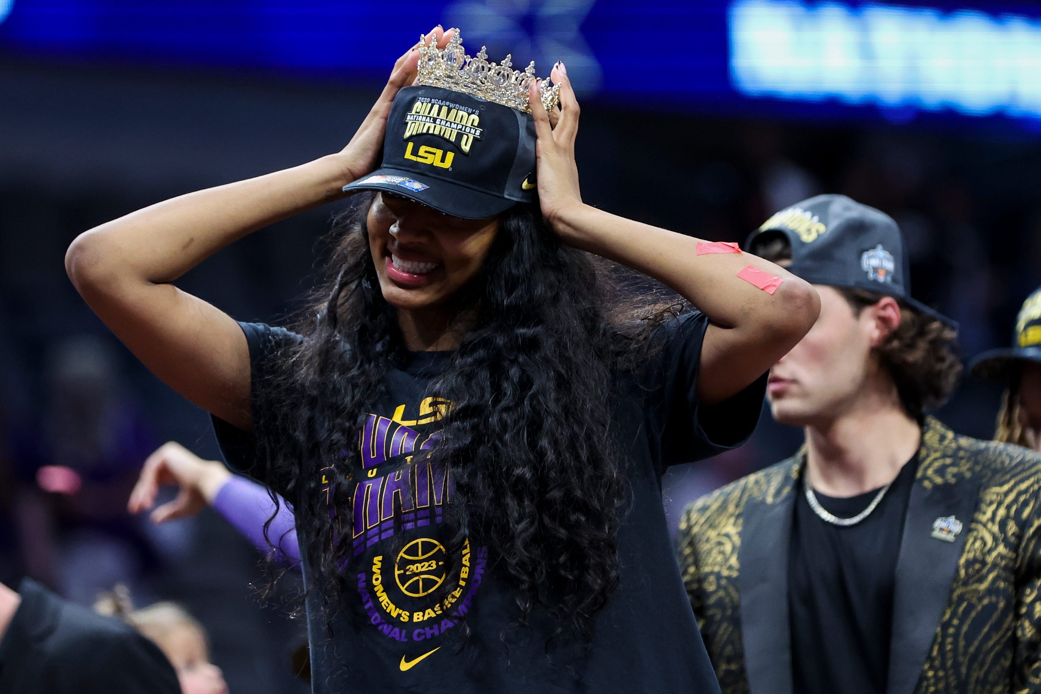 Apr 2, 2023; Dallas, TX, USA; LSU Lady Tigers forward Angel Reese celebrates after defeating the Iowa Hawkeyes during the final round of the Women's Final Four NCAA tournament at the American Airlines Center. Mandatory Credit: Kevin Jairaj-USA TODAY Sports